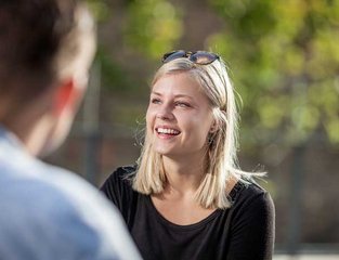 Female student smiling Photo: Jesper Rais for Aarhus University