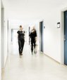 Two women in a hospital corridor